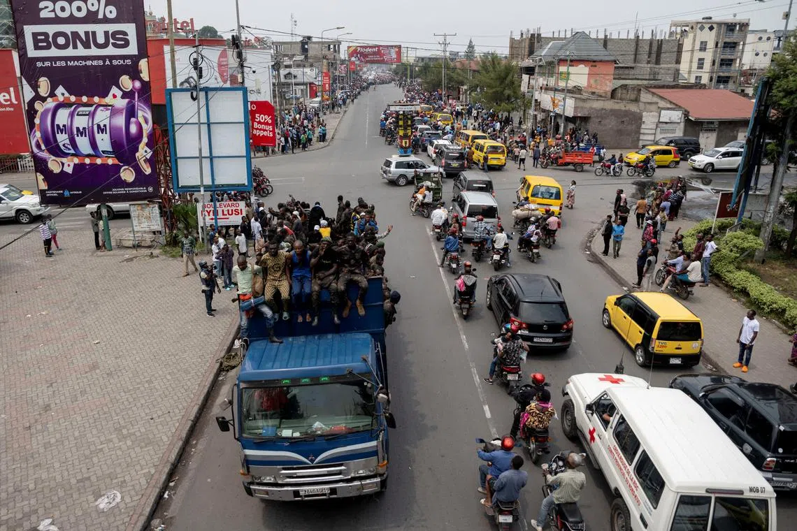Congolese potential recruits for the M23 rebel group react in a truck as they are taken to training centres run by M23 rebels, amid clashes between M23 rebels and the Armed Forces of the Democratic Republic of the Congo (FARDC), in Goma, North Kivu province in eastern Democratic Republic of the Congo, January 30, 2025. REUTERS/Arlette Bashizi