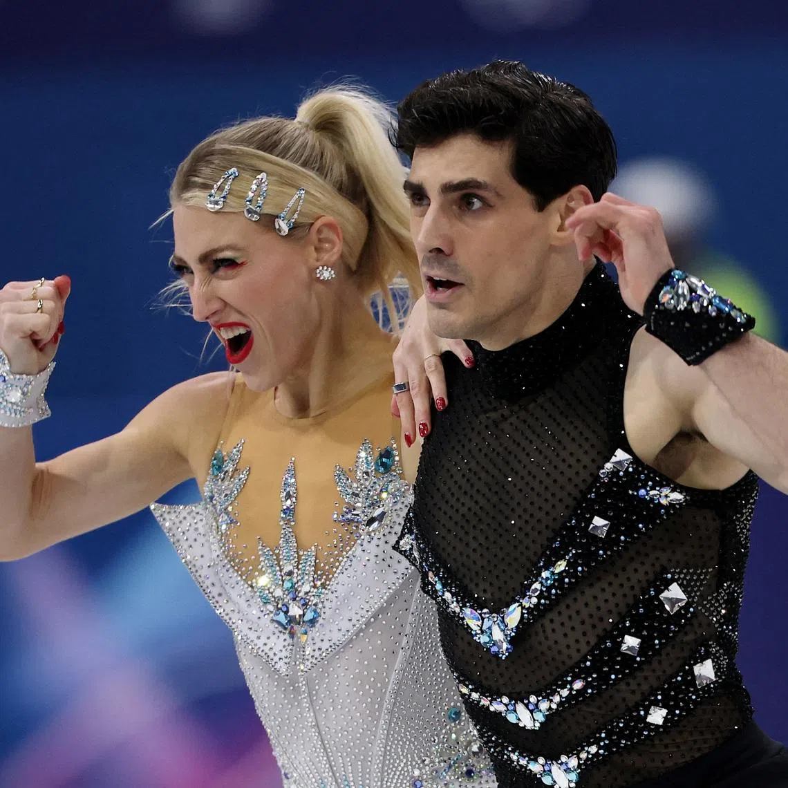 Milano Cortina 2026 Olympics - Figure Skating - Ice Dance - Rhythm Dance - Milano Ice Skating Arena, Milan, Italy - February 09, 2026. Piper Gilles of Canada and Paul Poirier of Canada perform during the Rhythm Dance REUTERS/Yara Nardi