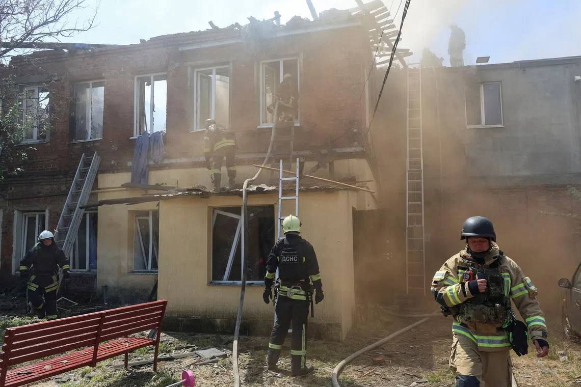 FILE PHOTO: Rescuers work at the site of the Russian drone strike, amid Russia's attack on Ukraine, in Kharkiv, Ukraine July 7, 2025. REUTERS/Vyacheslav Madiyevskyy/File Photo