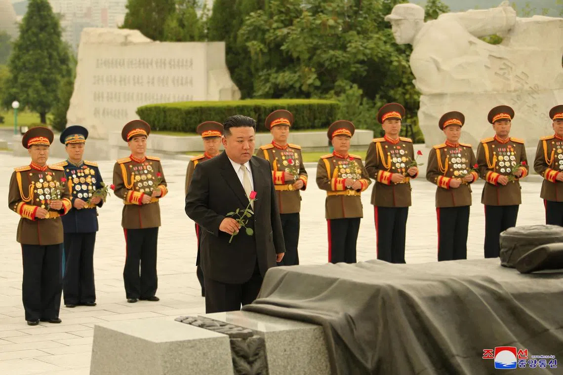 North Korean leader Kim Jong Un places a flower during a visit to the tomb of the veterans of the Fatherland Liberation War, in Pyongyang,  in this photo released on Wednesday by North Korea's Korean Central News Agency (KCNA). 