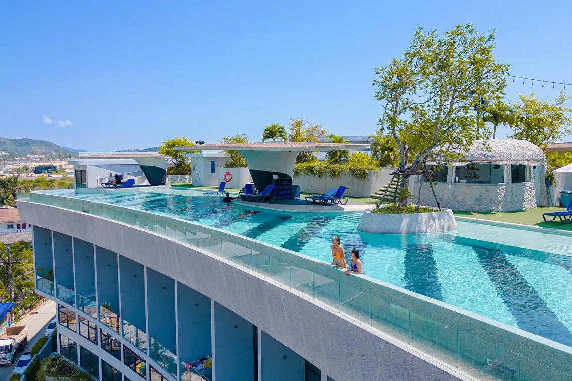 Facilities such as co-working space, a rooftop pool, a gym and a restaurant with a weekly cleaning service are included in the fee. 