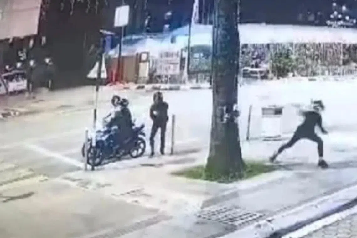 A molotov cocktail being thrown outside a nightclub near Jalan Yap Kwan Seng in Malaysia. 