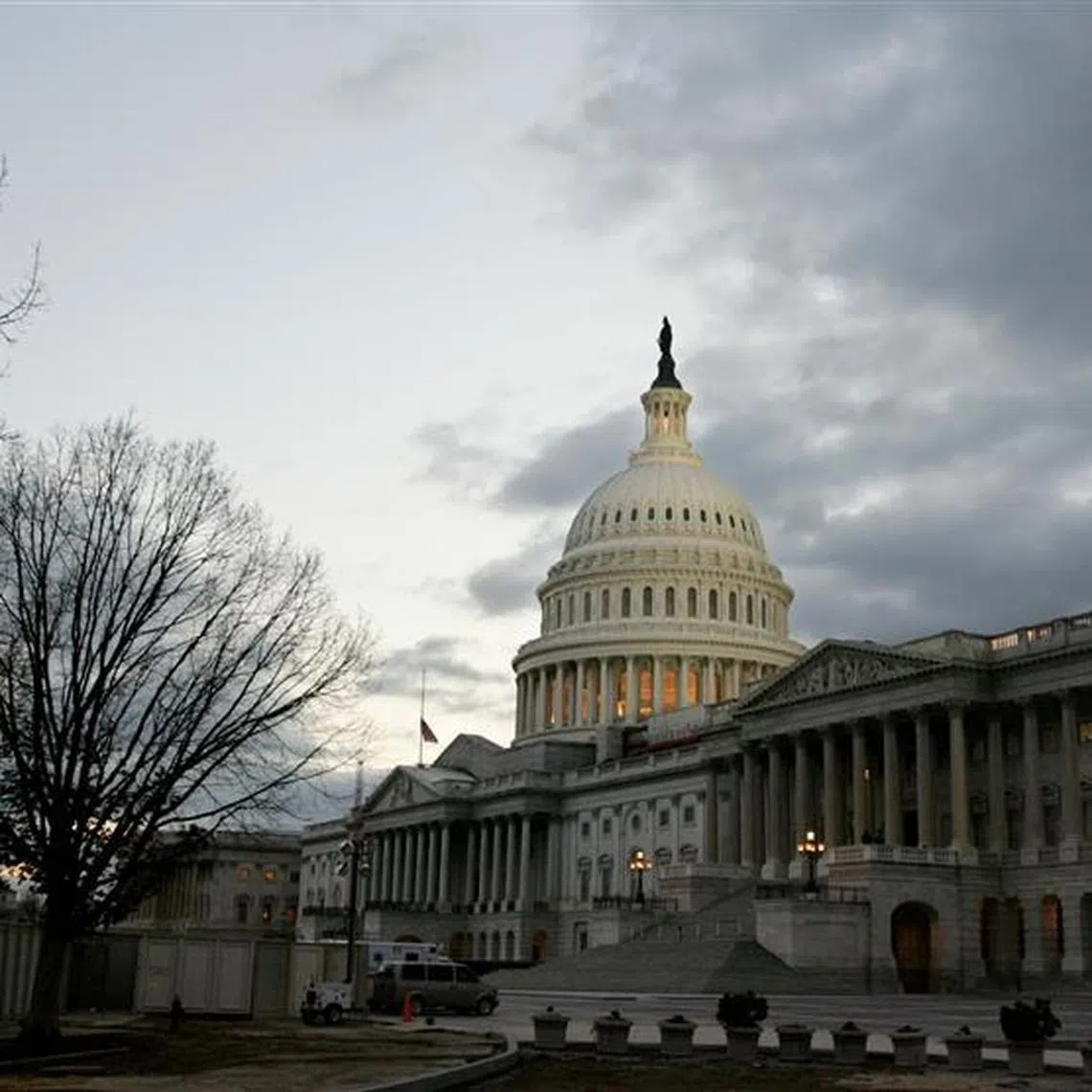 FILE PHOTO: The dome of the United States Capitol building is illuminated at twilight on Capitol Hill in Washington January 31, 2006./File photo