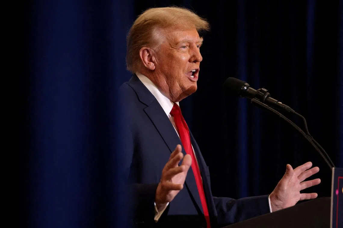FILE PHOTO: Republican presidential candidate and former U.S. President Donald Trump attends a campaign event in Waterloo, Iowa, U.S. December 19, 2023. REUTERS/Scott Morgan/File Photo