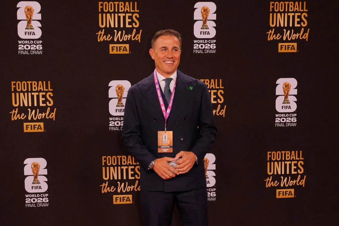 FILE PHOTO: Soccer Football - FIFA World Cup 2026 - FIFA World Cup 2026 Draw - John F. Kennedy Center for the Performing Arts, Washington, D.C., U.S. - December 5, 2025 Uzbekistan coach Fabio Cannavaro arrives on the red carpet ahead of the FIFA World Cup 2026 Draw REUTERS/Brian Snyder/File Photo