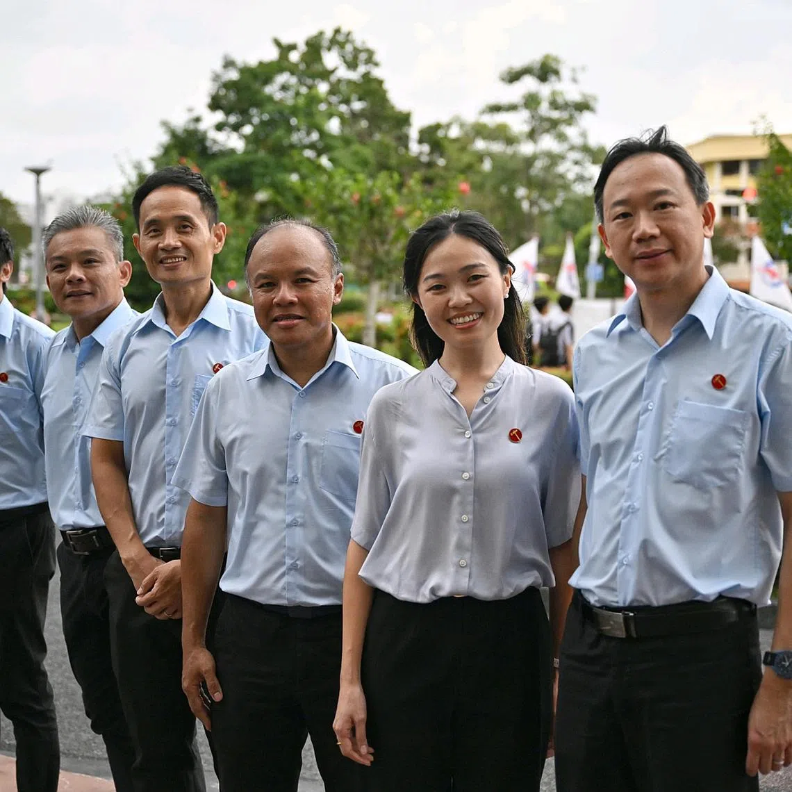 WP’s Tampines Changkat candidate Kenneth Foo (third from left) and Tampines GRC candidates (from left) Michael Thng, Jimmy Tan, Faisal Manap, Eileen Chong and Ong Lue Ping.