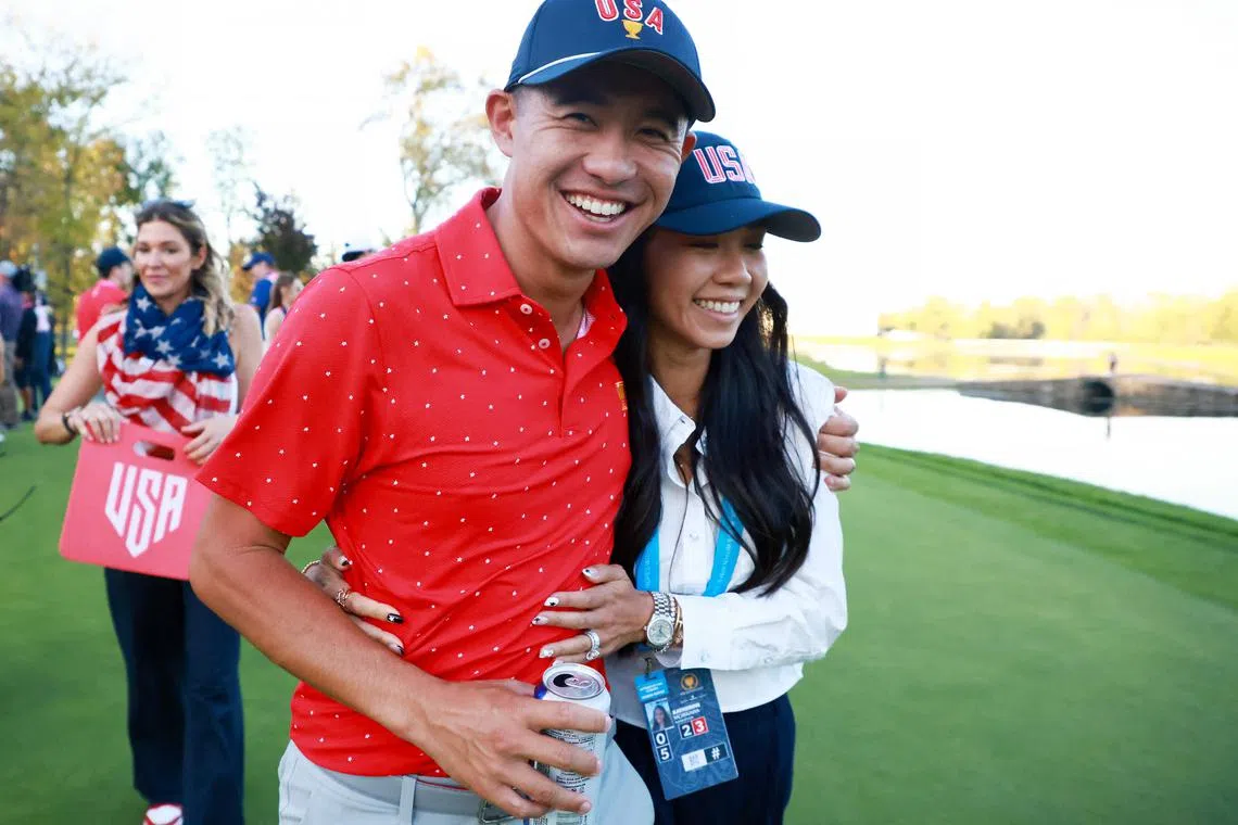 American Collin Morikawa and wife Katherine Morikawa celebrate after defeating the International Team at the 2024 Presidents Cup on Sept 29.