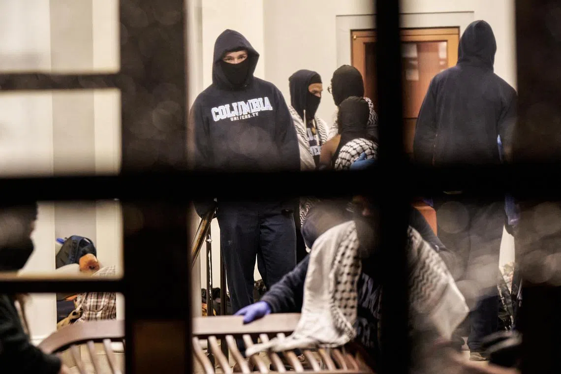 Pro-Palestine student protesters occupy Hamilton Hall on the campus of Columbia University in New York after seizing the building.