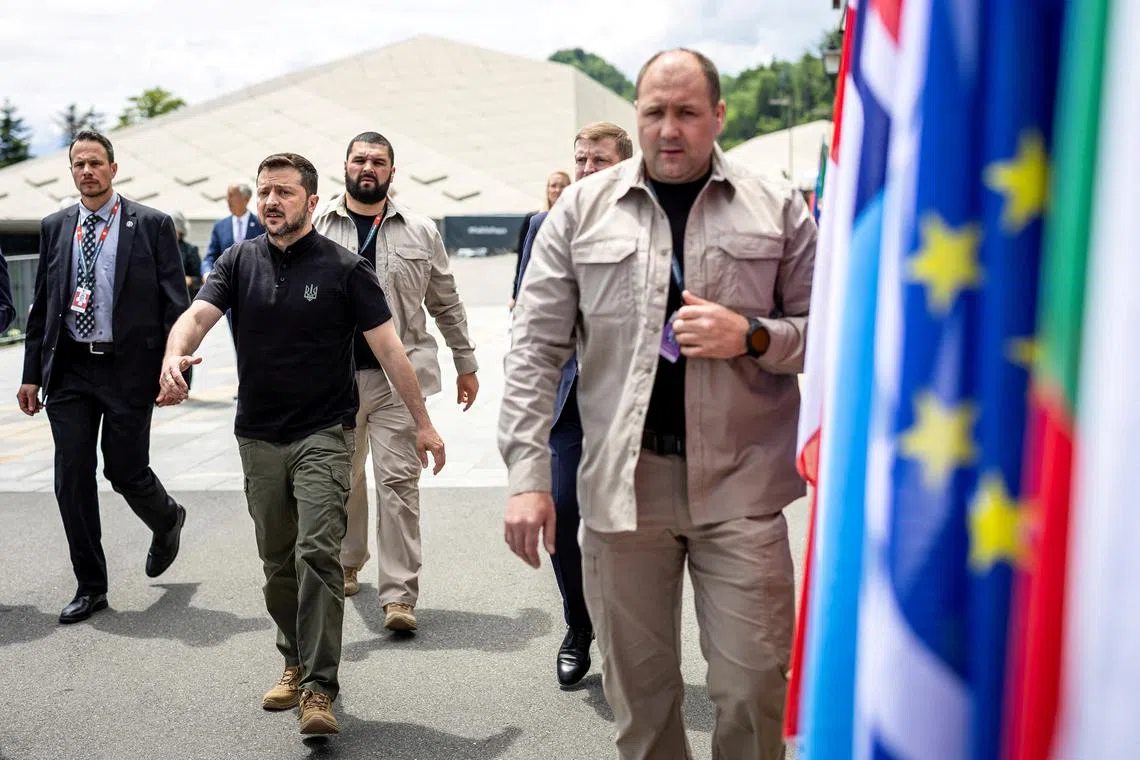 FILE PHOTO: Ukrainian President Volodymyr Zelenskiy walks during the Summit on Peace in Ukraine, in Stansstad, Switzerland, June 16, 2024. MICHAEL BUHOLZER/Pool via REUTERS/File Photo
