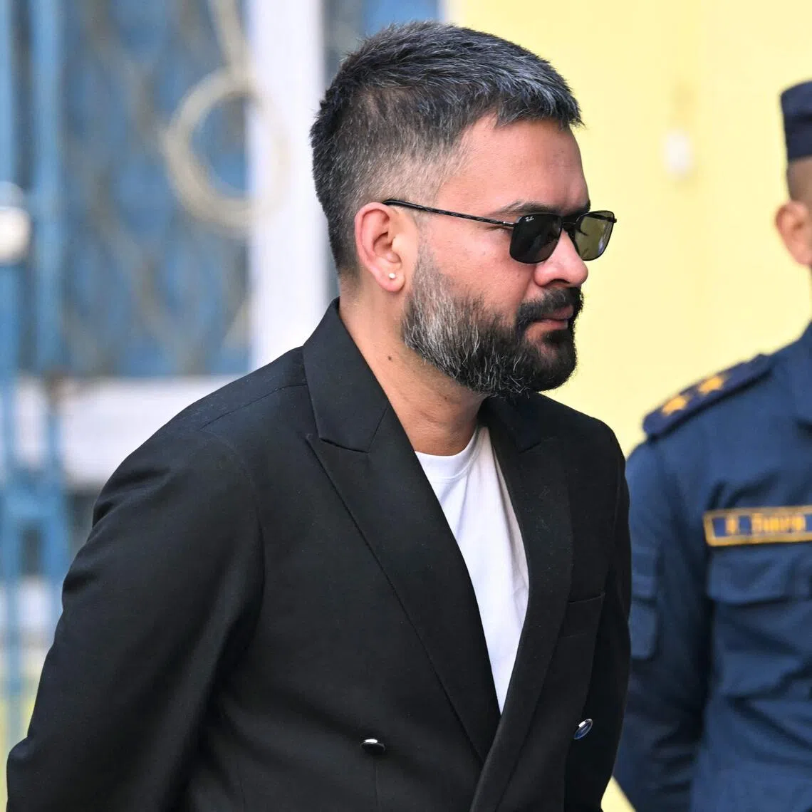 Mr Balendra Shah (left) is seen at a polling station as he votes during Nepal's parliamentary election in Kathmandu on March 5, 2026. 