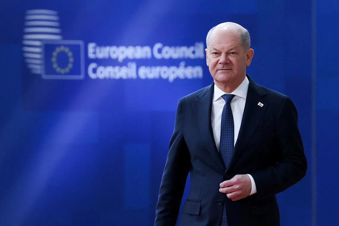German Chancellor Olaf Scholz walks to attend a European Union summit in Brussels, Belgium March 20, 2025. REUTERS/Yves Herman