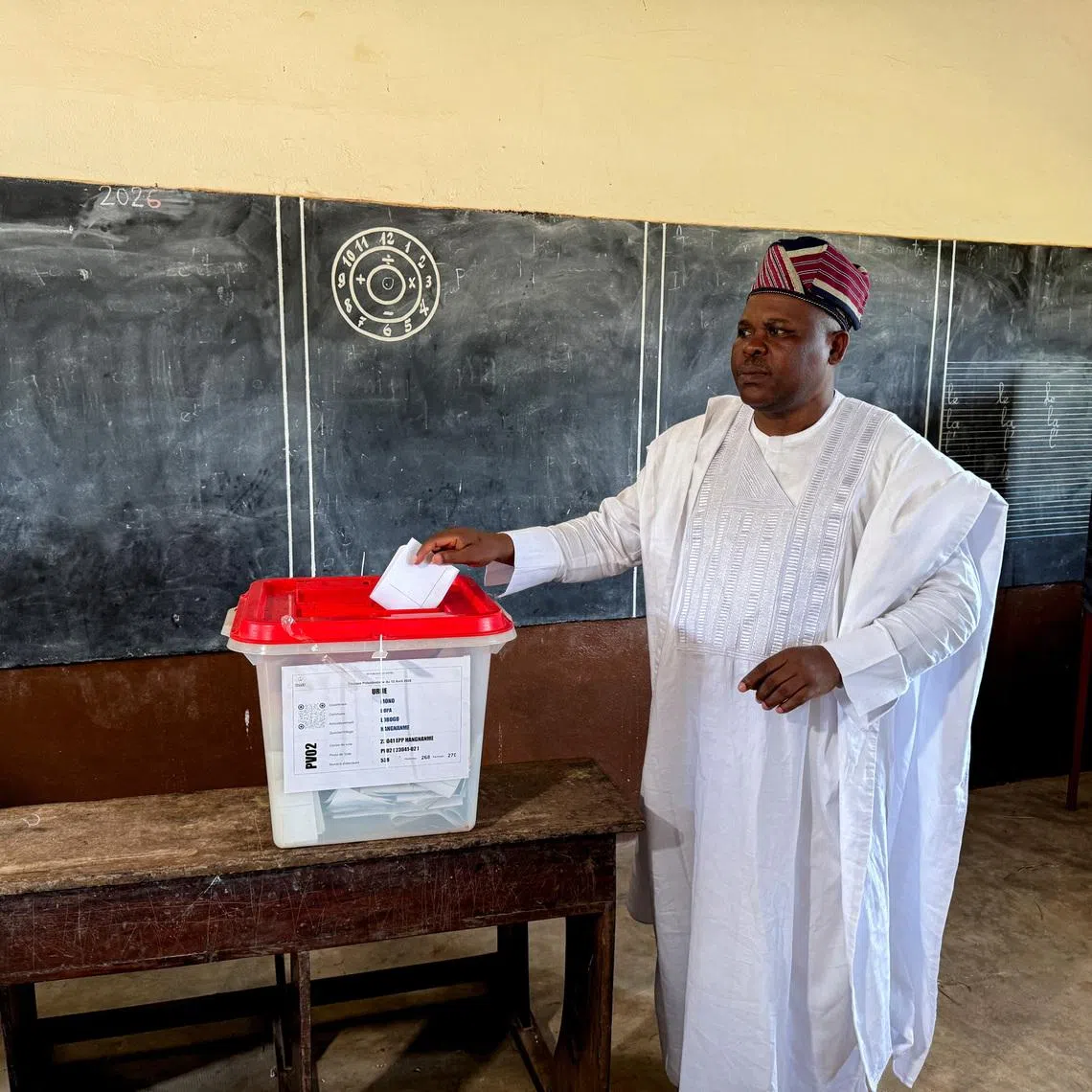 Presidential candidate Paul Hounkpe of FCBE (Force Cauris pour un Benin Emergent) votes during the presidential election, at a polling station in Bopa, Benin April 12, 2026. REUTERS/Stringer
