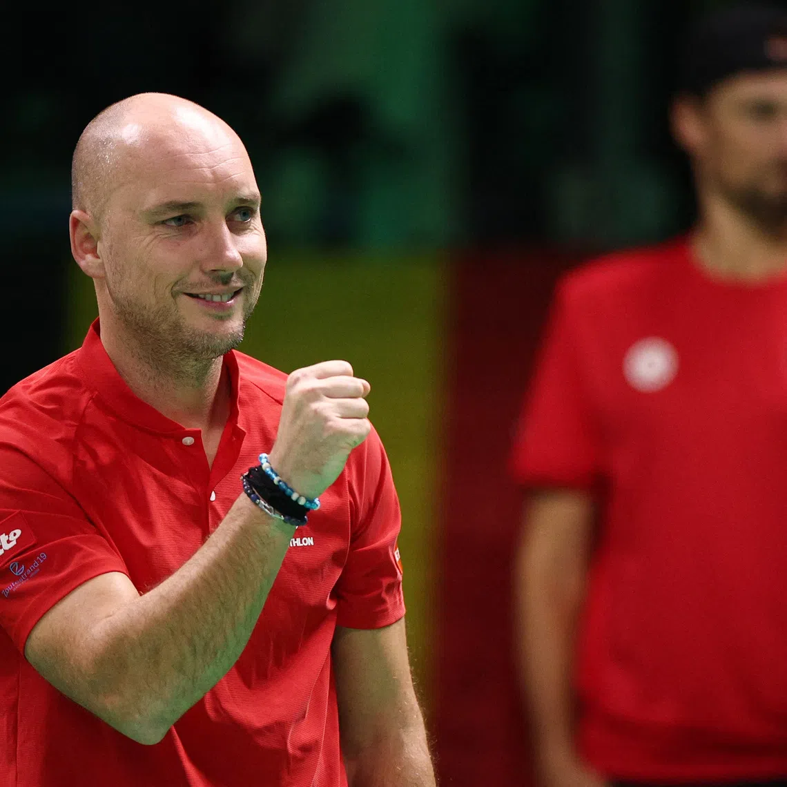 Tennis - Davis Cup - Final 8 - France v Belgium - Unipol Arena, Bologna, Italy - November 18, 2025 Belgium captain Steve Darcis reacts after Belgium's Zizou Bergs wins the first set of his singles match against France's Arthur Rinderknech REUTERS/Guglielmo Mangiapane