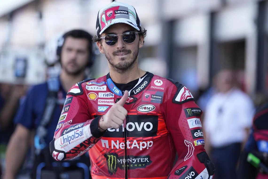 Francesco Bagnaia of Italy and Ducati Lenovo Team celebrates the best time in qualifying at the Motorcycling Grand Prix of San Marino and Riviera di Rimini at Marco Simoncelli Circuit in Italy on Sept 7, 2024.