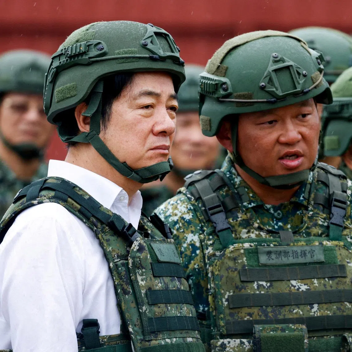 FILE PHOTO: A soldier speaks to Taiwan's President Lai Ching-te in Hsinchu, Taiwan July 10, 2025. REUTERS/Ann Wang/File Photo