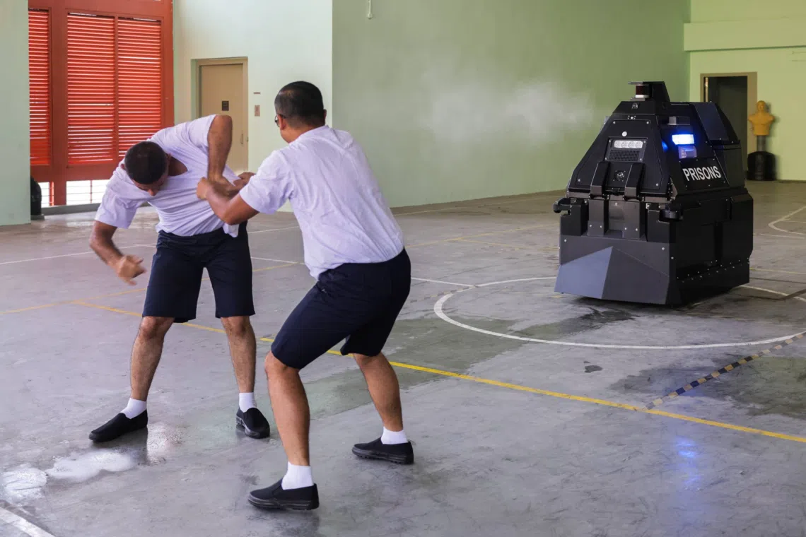 The robot called PROTECT developed by the Singapore Prison Service and Home Team Science and Technology Agency during a media preview at Changi Prison Complex on Sept 3.