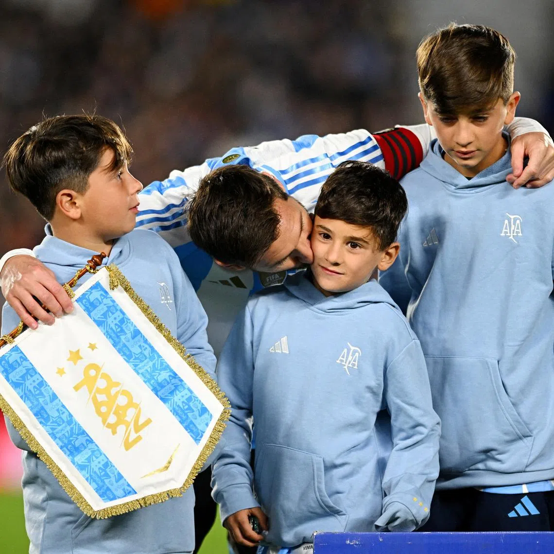 Argentina superstar Lionel Messi holding back tears during the warm-up as he stood alongside his three sons for the Argentine national anthem in what could be his final World Cup qualifying match on home ground in Estadio Monumental, Buenos Aires, Argentina on Sept 4, 2025.