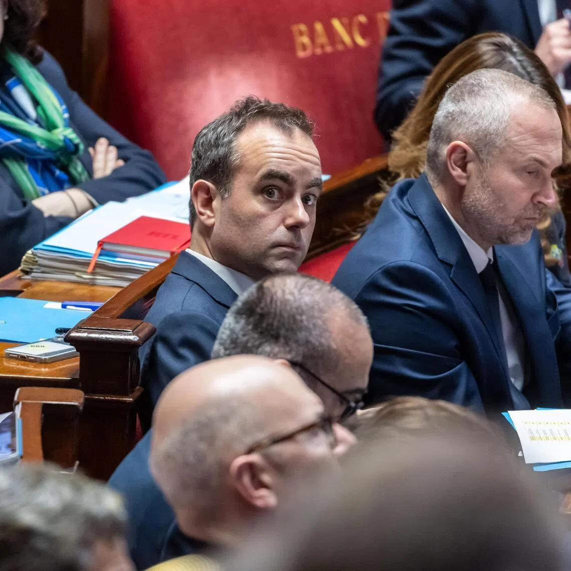 French Prime Minister Sebastien Lecornu (centre) and his government will now likely face no-confidence motions from the opposition.
