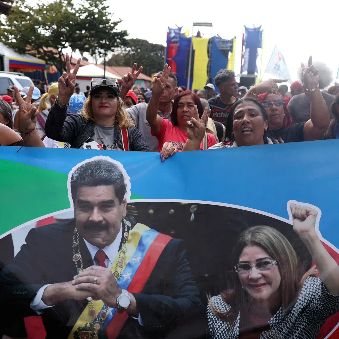 FILE PHOTO: Supporters of Venezuela's government rally to demand the release of ousted President Nicolas Maduro and his wife, Cilia Flores, two months after their capture by the U.S., in Caracas, Venezuela March 3, 2026. REUTERS/Leonardo Fernandez Viloria/File Photo
