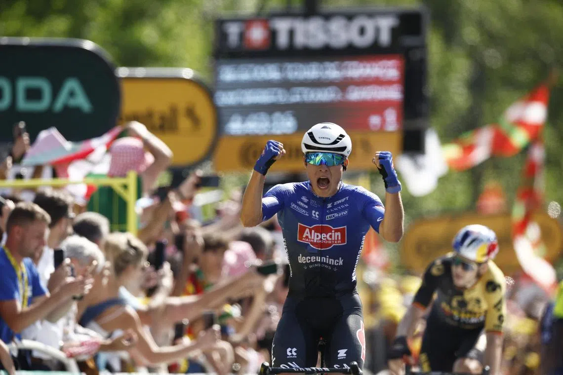 Alpecin–Deceuninck's Jasper Philipsen celebrating winning stage three of the Tour de France on Monday.