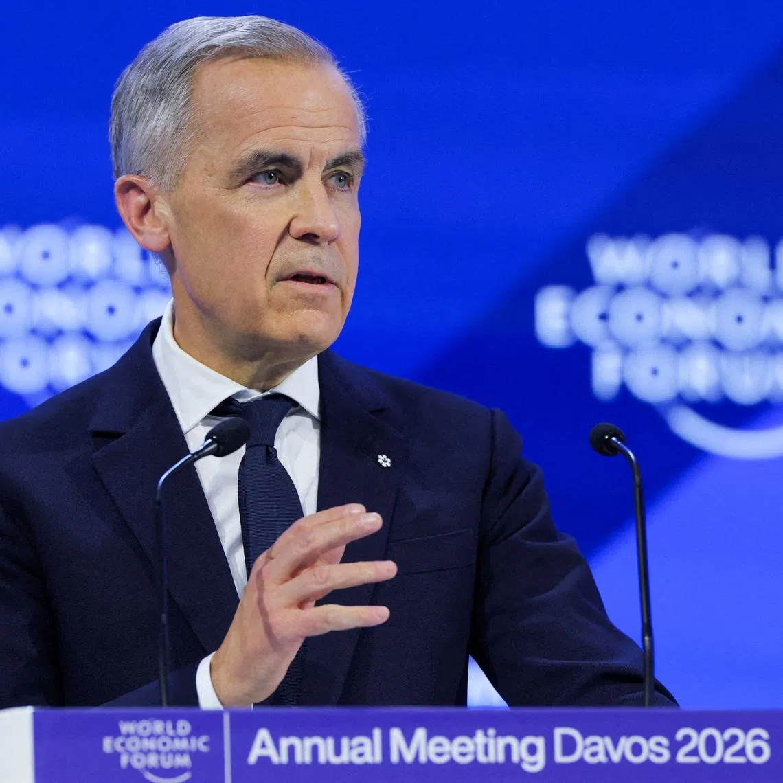 FILE PHOTO: Canada's Prime Minister Mark Carney speaks during the 56th annual World Economic Forum (WEF) meeting in Davos, Switzerland, January 20, 2026. REUTERS/Denis Balibouse/File Photo