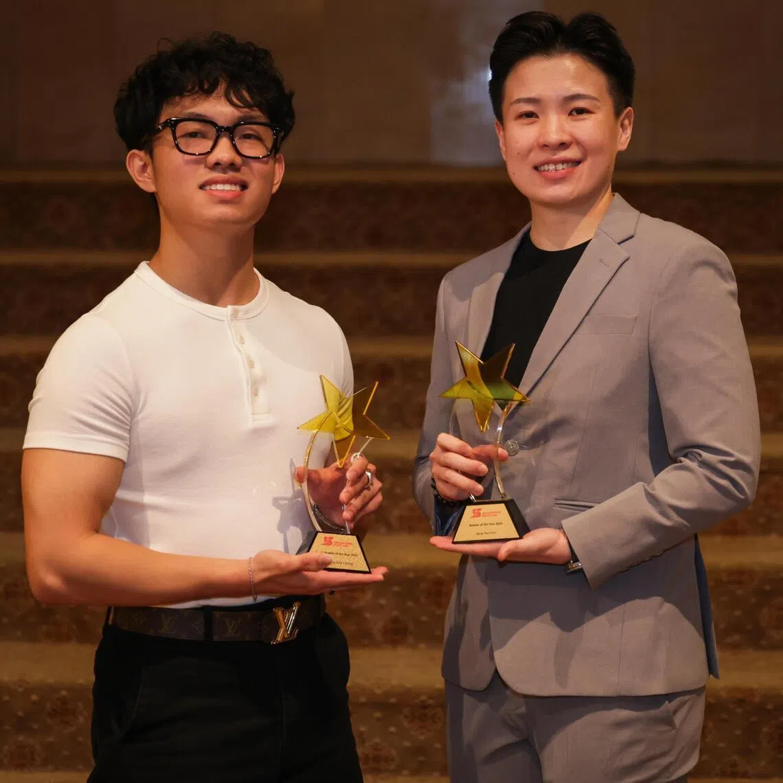 Portrait of New Hui Fen, 34, (right) recipient of the Bowler of the Year 2025 award; and Mike Ong, 20, recipient of theYouth Bowler of the Year 2025 award; at the Singapore Bowling Federation Awards 2026, held at Raffles Town Club on Apr 7, 2026.