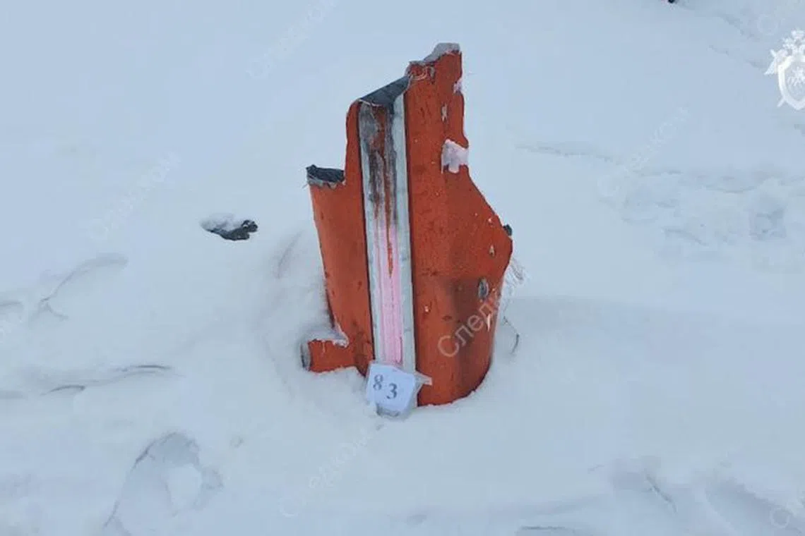 A views shows what the Russian Investigative Committee says is a fragment of a missile that was used to shoot down the Russian Ilyushin Il-76 military transport plane, at the crash site near the village of Yablonovo in the Belgorod region, Russia, in this still image from video released February 1, 2024. Russian Investigative Committee/Handout via REUTERS