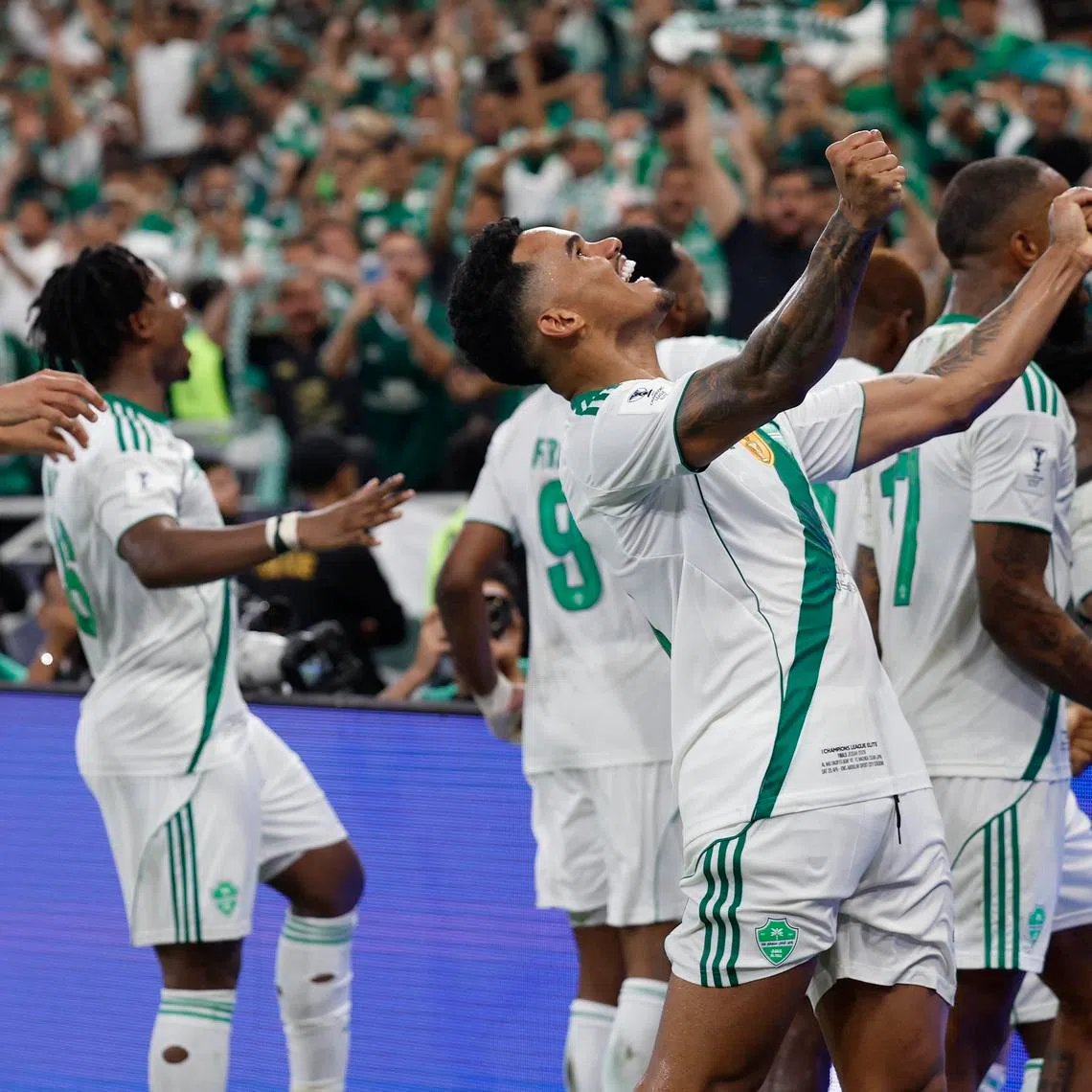 Soccer Football - Asian Champions League - Final - Al Ahli v Machida Zelvia - King Abdullah Sports City Stadium,  Jeddah, Saudi Arabia - April 25, 2026 Al Ahli's Galeno celebrates with teammates after Feras Al-Brikan scores their first goal REUTERS/Ibraheem Abu Mustafa