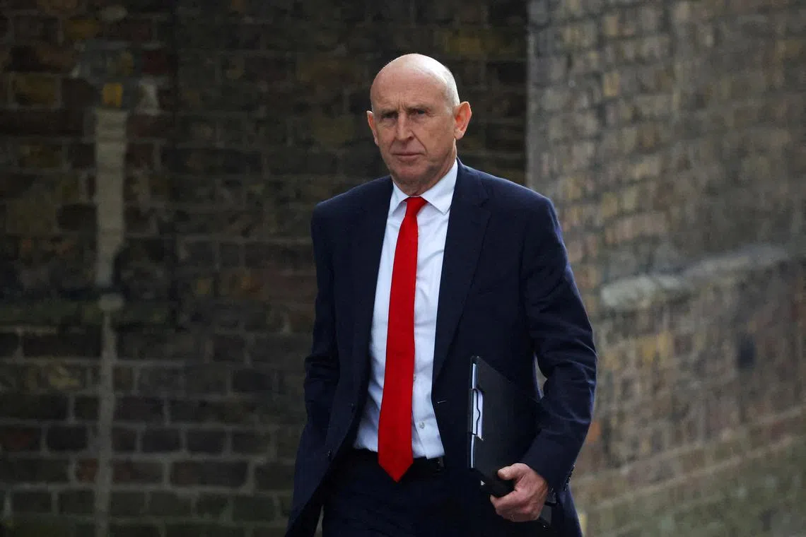 FILE PHOTO: Britain's Defence Secretary John Healey walks outside 10 Downing Street in London, Britain, September 3, 2024. REUTERS/Toby Melville/File Photo