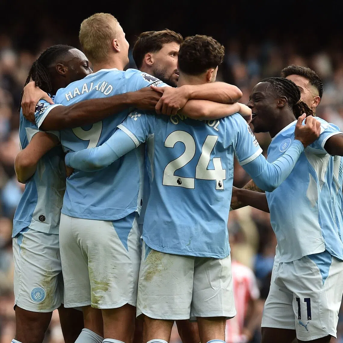 Manchester City’s Norwegian striker Erling Haaland (second from left) celebrates with teammates after scoring their fifth goal against Sunderland at the Etihad Stadium in Manchester, England.