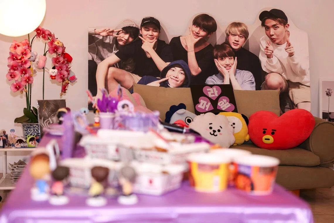 BTS-themed decorations, merchandise and food was set up at the watch party on March 21.