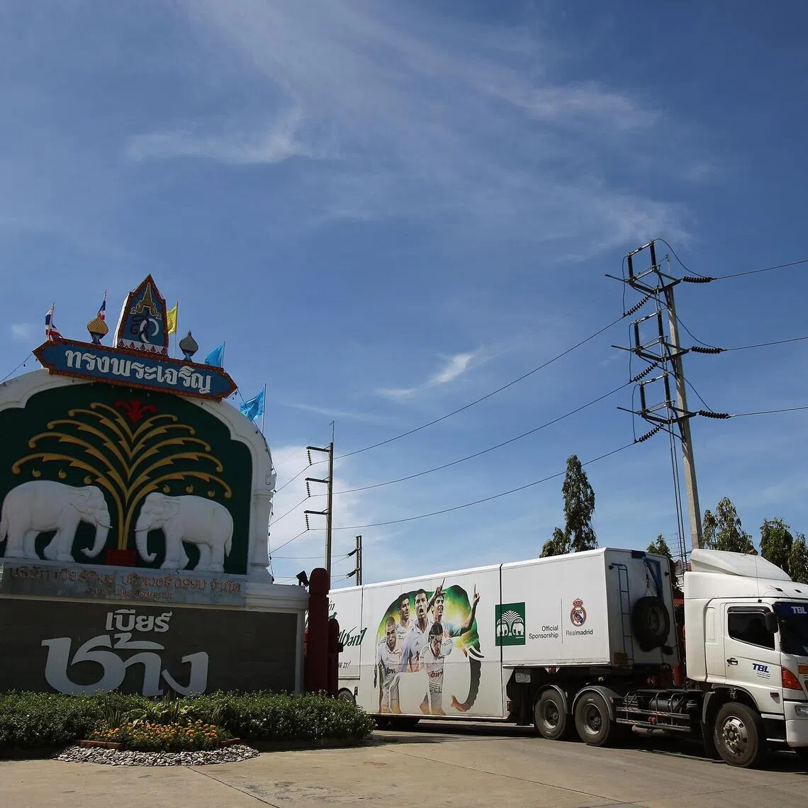 A ThaiBevtruck transporting Chang beer leaves the company's Beer Thip brewery in Bang Ban, Ayutthaya.