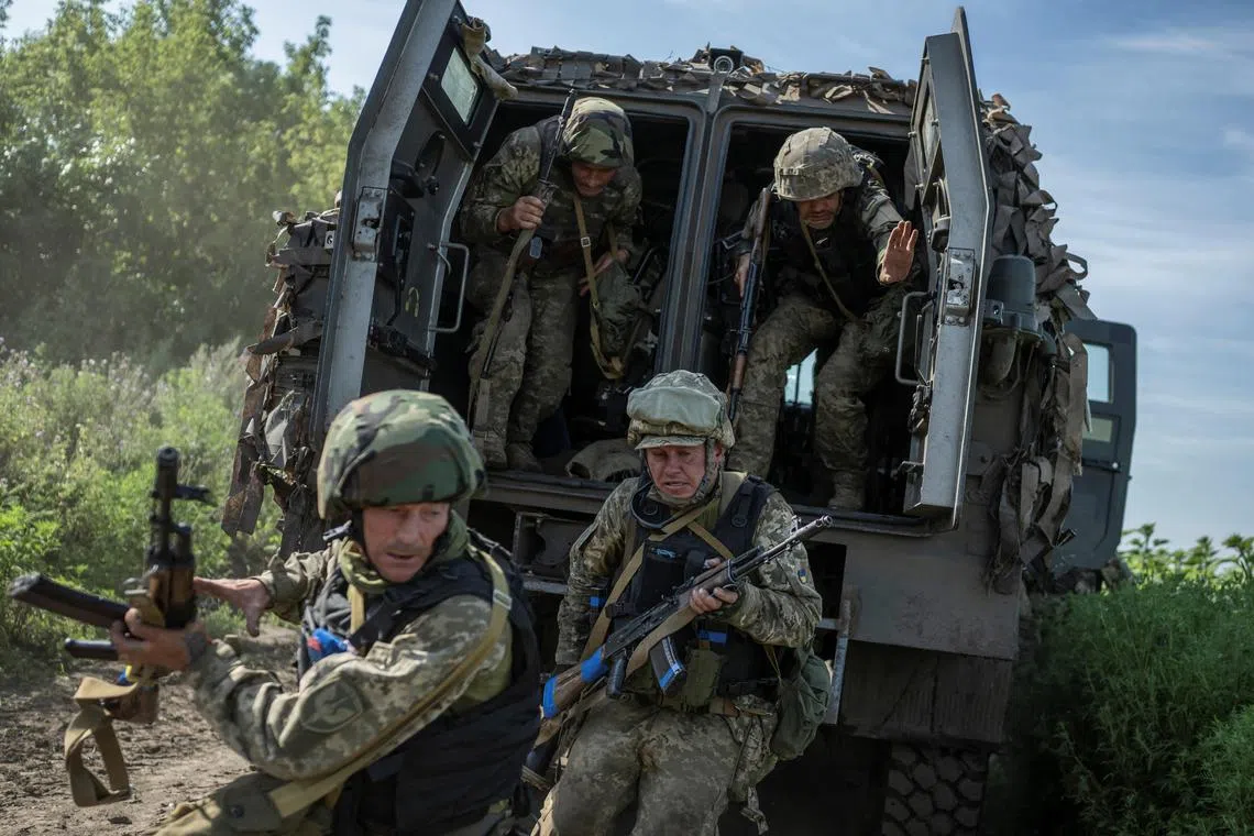 Ukrainian service members of the 35th Separate Marines Brigade attend a military drill near a frontline, amid Russia's attack on Ukraine, in Donetsk region, Ukraine July 31, 2023. REUTERS/Viacheslav Ratynskyi