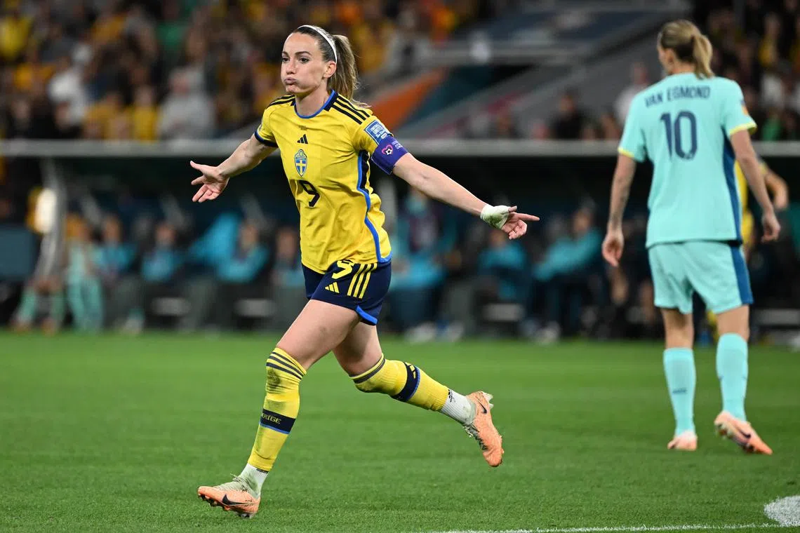 Kosovare Asllani celebrates after scoring Sweden's second goal.