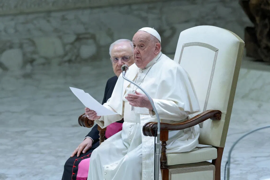 FILE PHOTO: Pope Francis attends the weekly general audience, in Paul VI hall at the Vatican, February 5, 2025. REUTERS/Remo Casilli/File Photo