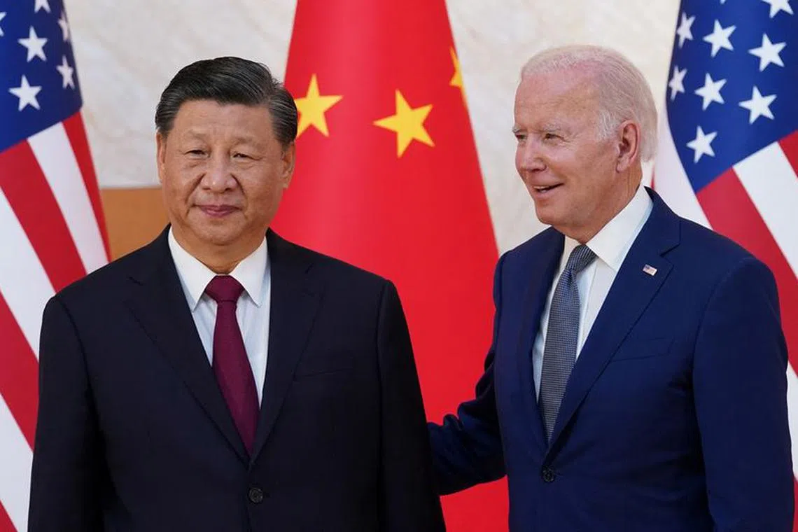 U.S. President Joe Biden meets with Chinese President Xi Jinping on the sidelines of the G20 leaders' summit in Bali, Indonesia, November 14, 2022.  REUTERS/Kevin Lamarque/File Photo