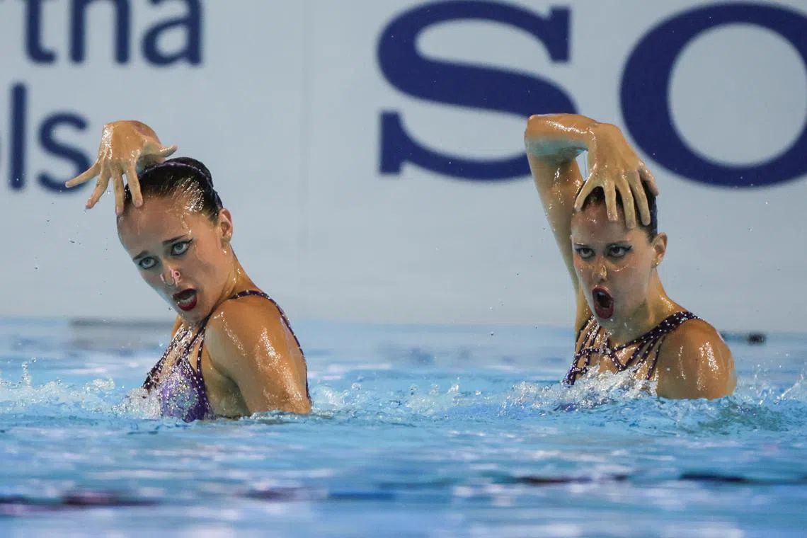 Spain's Iris Tio Casas and Lilou Lluis Valette (left) in action during the WCH artistic swimming Women Duet free finals at the World Aquatics Championships arena on July 24, 2025.