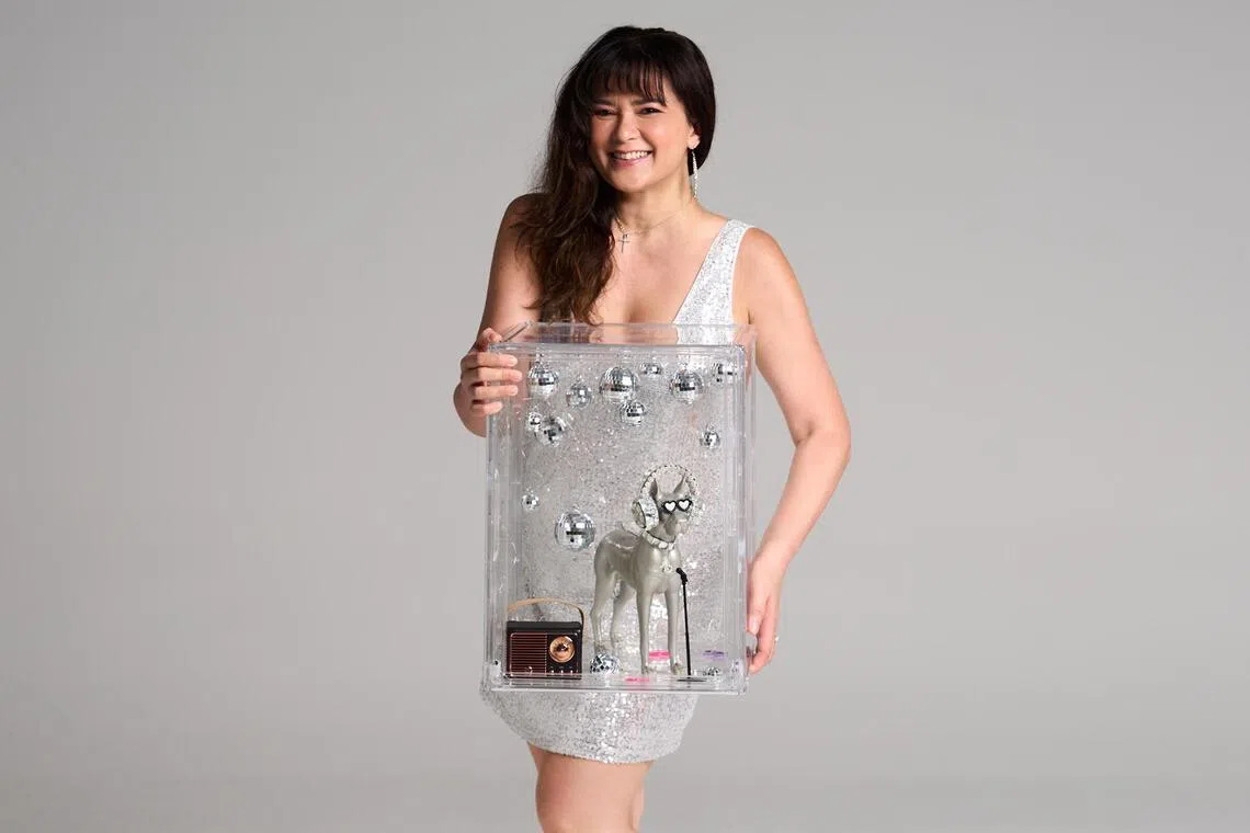 jspets07 - Former radio DJ Cheryl Miles and her painted dog mascot for Paws For A Cause, an online auction where 100 per cent of proceeds go to charity SOSD.

SOURCE / COPYRIGHT: PAWS FOR A CAUSE