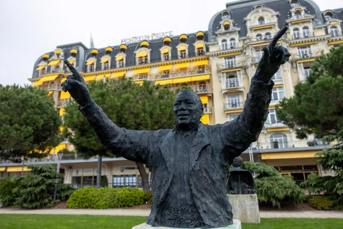 A statue of U.S. music producer Quincy Jones is pictured in front of the Montreux Palace hotel near the Montreux Jazz Festival venue in Montreux, Switzerland, November 4, 2024. REUTERS/Denis Balibouse