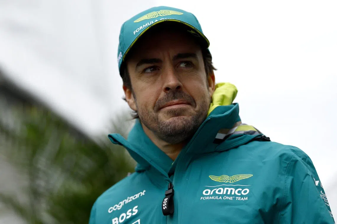 FILE PHOTO: Formula One F1 - Japanese Grand Prix - Suzuka Circuit, Suzuka, Japan - April 5, 2024 Aston Martin's Fernando Alonso before practice REUTERS/Issei Kato/File Photo
