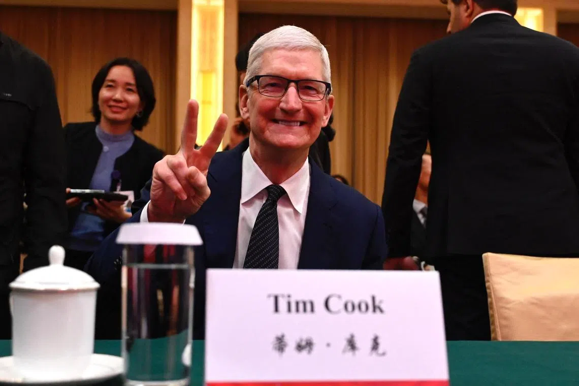 Apple's Chief Executive Officer Tim Cook attends the China Development Forum in Beijing on March 24, 2024. (Photo by Pedro Pardo / AFP)