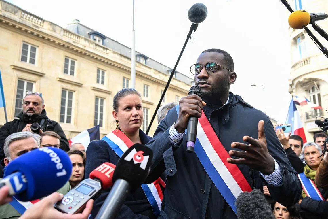 France Insoumise party parliament member Carlos Martens Bilongo delivers a speech during a demonstration outside the National Assembly in Paris, on Nov 4, 2022.