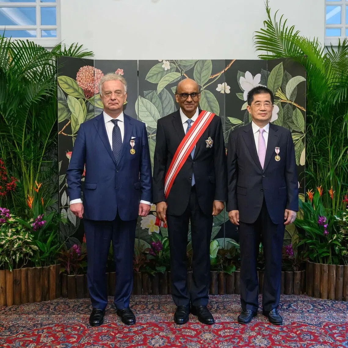 President Tharman Shanmugaratnam (centre) with Evonik Industries CEO Christian Kullmann (left) and UMC chairman Stan Hung at the Istana on July 8.