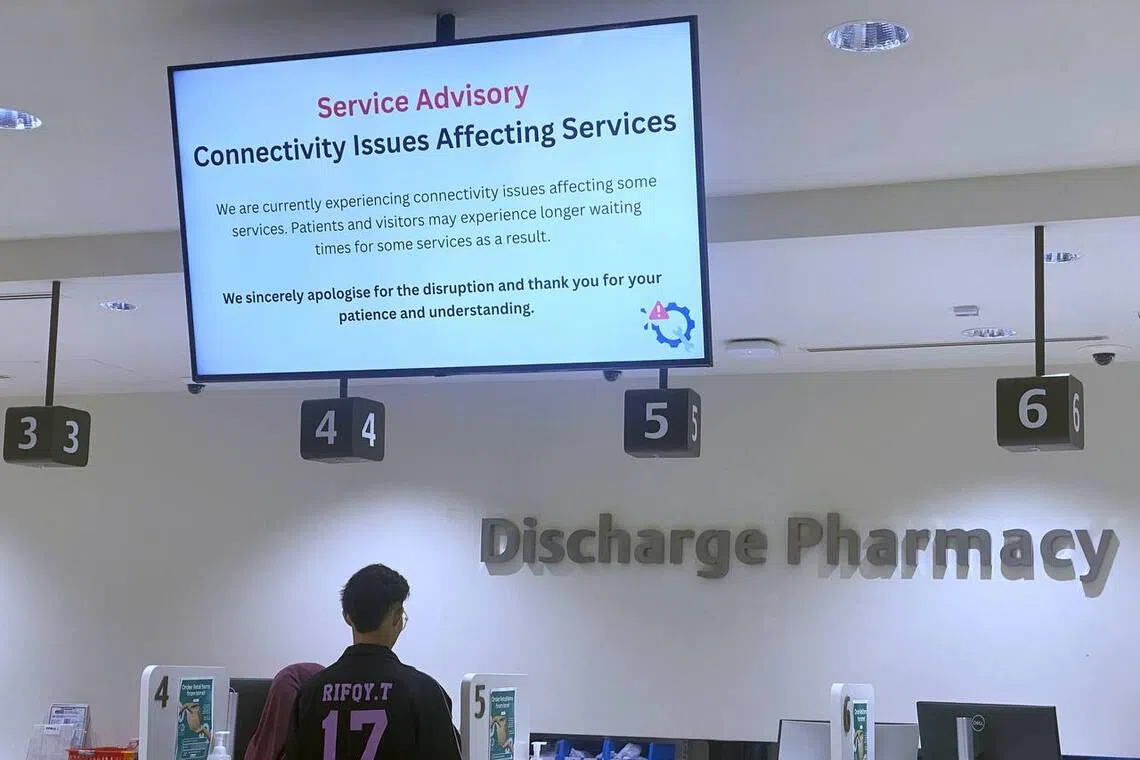 An announcement at the pharmacy at Ng Teng Fong General Hospital pharmacy about the outage on Oct 13.