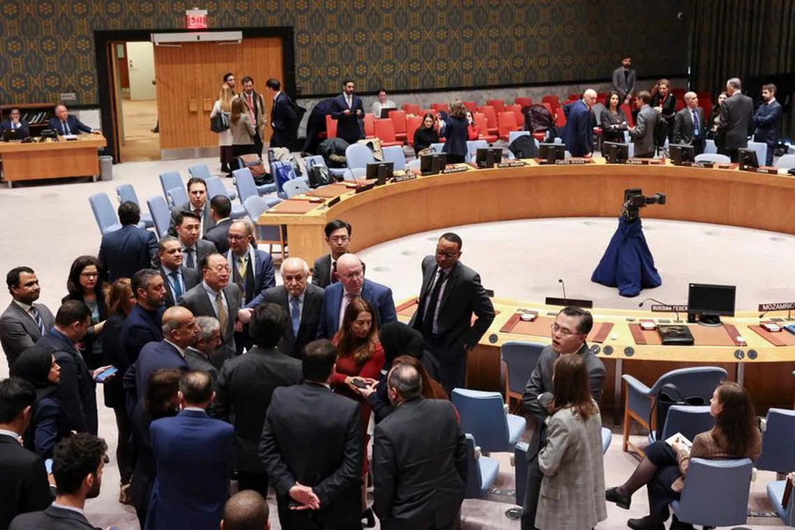 Egypt's current Permanent Representative of Egypt to the U.N. Osama Abdekhalek, Russian Ambassador to the U.N. Vassily Nebenzia, Palestinian U.N. envoy Riyad H. Mansour, and Chinese Ambassador to the U.N. Zhang Jun interact on the day of a meeting of Members of the United Nations Security Council for voting on a proposal to demand that Israel and Hamas allow aid access to the Gaza Strip via land, sea and air routes and set up U.N. monitoring of the humanitarian assistance delivered during a meeting at the U.N. headquarters in New York, U.S., December 19, 2023.  REUTERS/Shannon Stapleton
