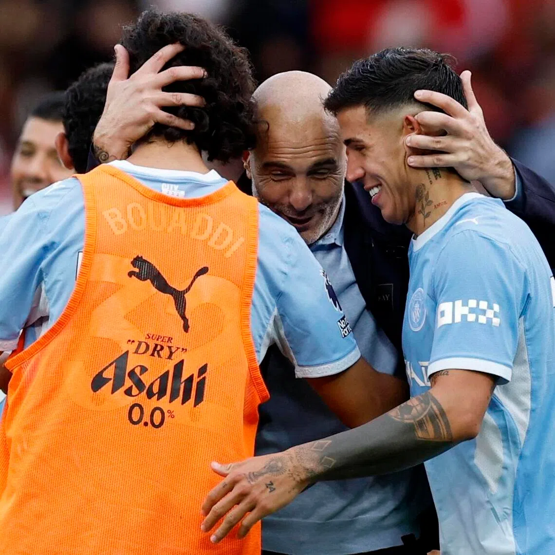 Manchester City manager Enzo Maresca celebrates with Ayyoub Bouaddi and Enzo Fernandez after the match.