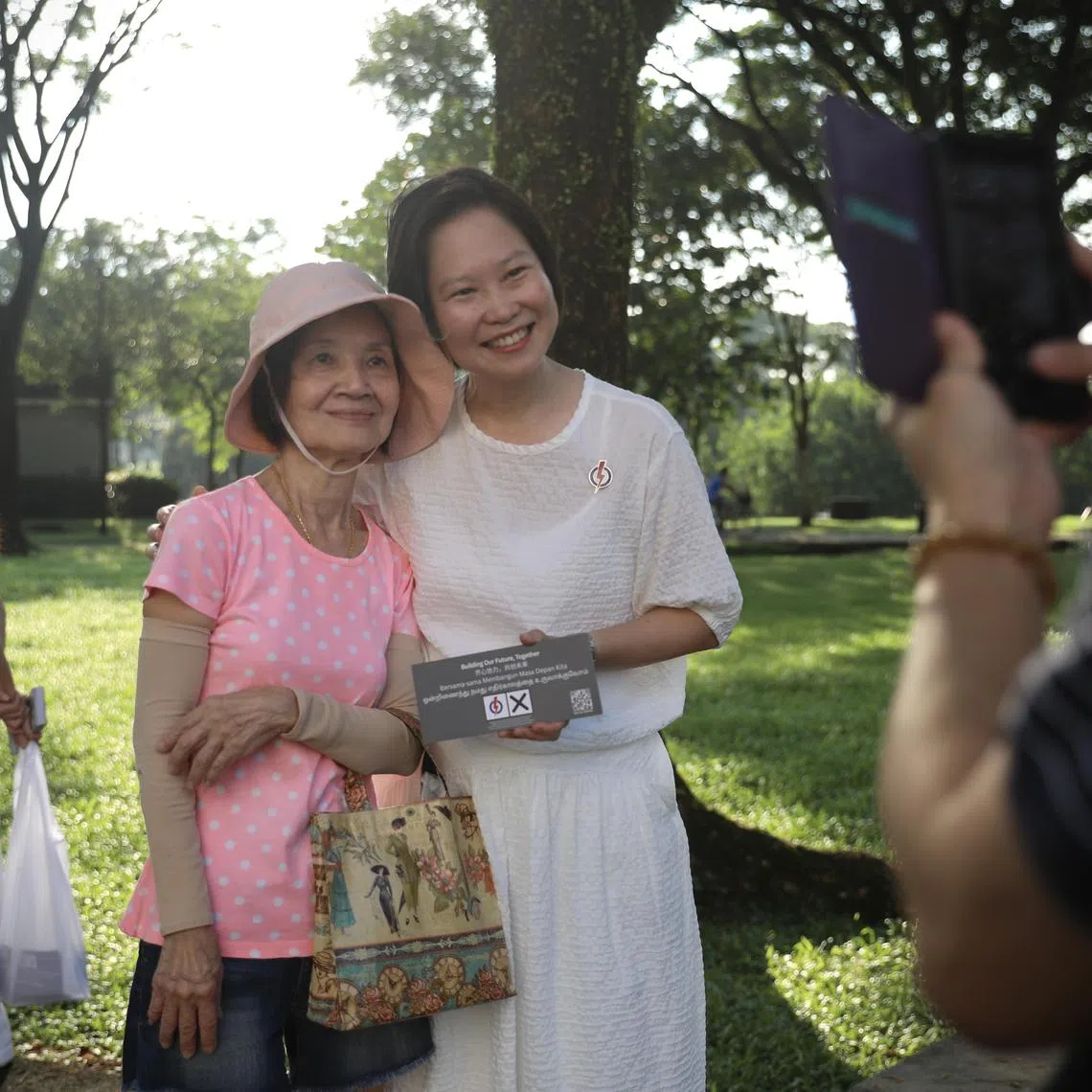 ST20250426_202524700159/etgsh26/Taryn Ng/Elisha Tushara//

PAP candidate for Marymount SMC Gan Siow Huang greets residents at Bishan Park and along Bishan Street 22 on April 26, 2025. ST PHOTO: TARYN NG