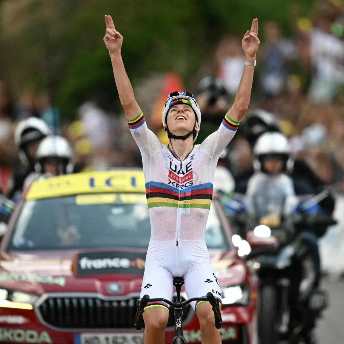 XRG’s Slovenian rider Tadej Pogacar cycles to the finish line on July 9 to win the 6th stage of the 2026 Tour de France.