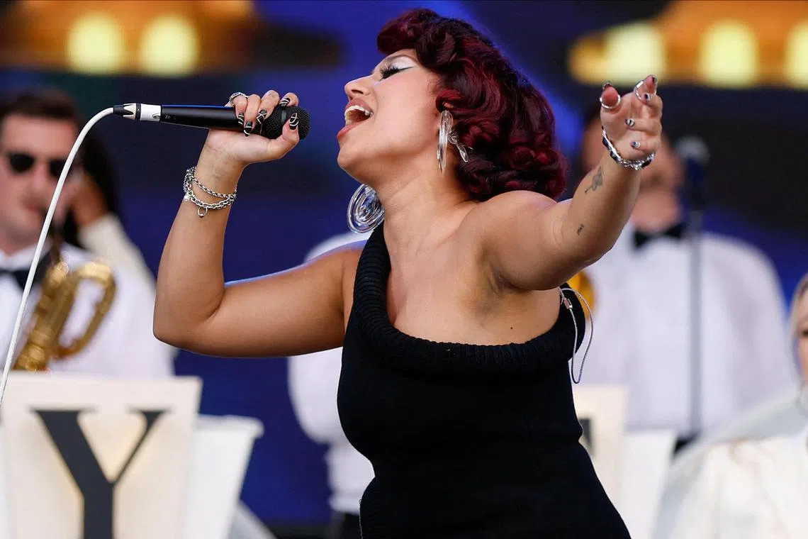 British singer-songwriter Raye performing at the Glastonbury Festival in June 2023. The festival was criticised for having only male headliners.