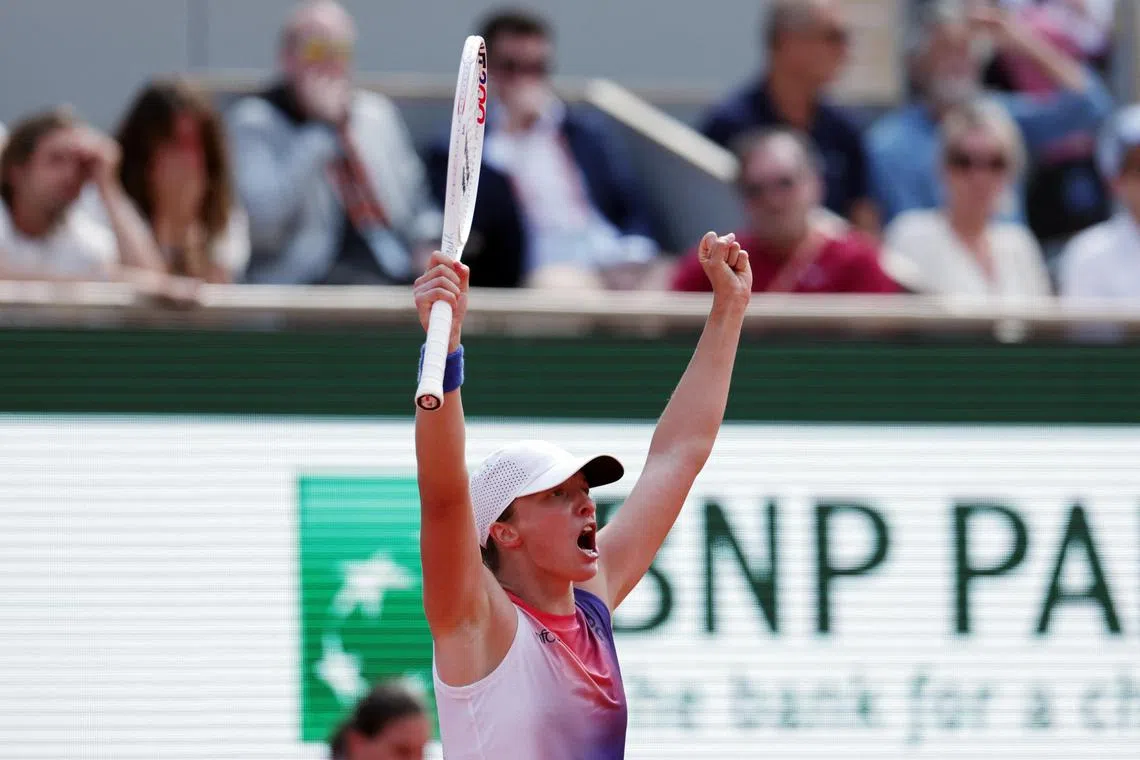 Poland's Iga Swiatek celebrates winning her semi-final match against the US' Coco Gauff.